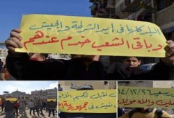 ثوار ‏بورسعيد يرفعون لافتات منددة بحكم العسكر.