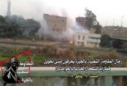 بالصور ..  المقاومة الشعبية تحرق مبني تحويل القطارات بالحوامدية