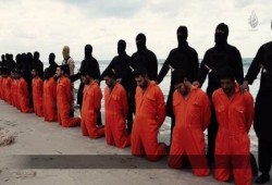 بالصور.. تسجيل يظهر إعدام تنظيم "داعش" المتطرف لـ21 قبطيا مصريا في ليبيا