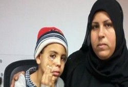 أمين شرطة  بدرجة بلطجي يطلق النار  عشوائيا ويصيب طفل في حي الخليفة ويهدد والدته