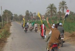 بنى سويف: مسيرة بالدراجات البخارية ترفع علم مصر وشعار رابعة بالفشن