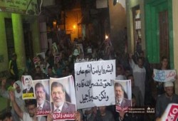 ثوار المنصورية يهتفون للرئيس مرسي: راجع بإذن الله
