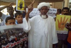 فيديو.. السيسي في السودان بلا استقبال.. ومتظاهرون يرفعون شارات رابعة