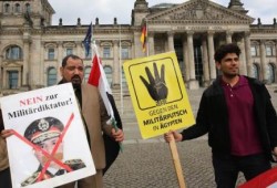 الصحافة الألمانية تدعو ميركل لإثارة "حرية التعبير" مع السيسي