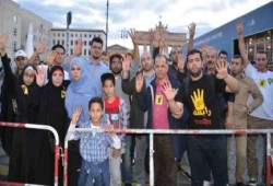 بالفيديو.. "الإعدام" يخنق السيسي في برلين.. وحصاد الزيارة المشئومة صفر