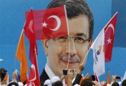أردوغان يكلف أوغلو برئاسة حكومة تصريف الأعمال
