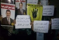 وقفة لنساء ضد الانقلاب بالعريش ضمن فعاليات "عودوا لثكاناتكم"
