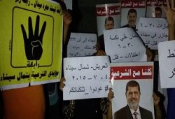 وقفة ليلية بالعريش في الذكرى الثانية للانقلاب العسكري الدموي