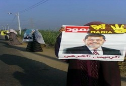 سلسلة بشرية لثوار أم الرضا بدمياط تطالب برحيل حكم العسكر