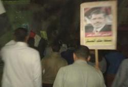 أعلام رابعة وصور الرئيس مرسي تزين تظاهرات مركز "يوسف الصديق" بالفيوم