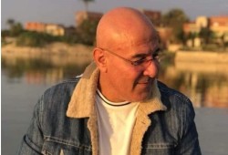 انتحار صحفي بالأهرام بمكتبه انفصلت رأسه عن جسده.. وعلامات استفهام حول الحادث