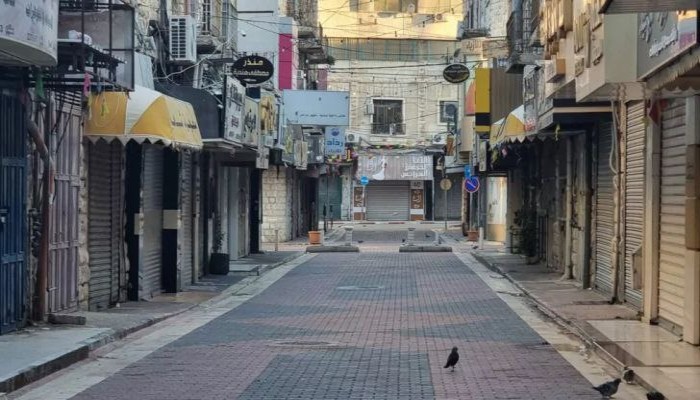 إضراب شامل في رام الله والبيرة حداداً على أرواح الشهداء .