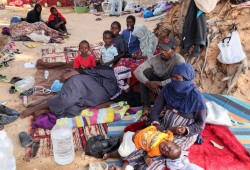 اللاجئون السودانيون يواجهون "لعبة السلم والثعبان" القاتلة في ليبيا