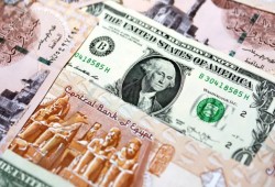 "جولدمان ساكس": سعر الفائدة المرتفع والأموال الساخنة سيعصفان بالاقتصاد المصري