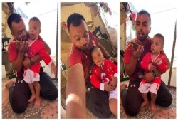 شاهد || نجم الأهلي "أفشة" يعد الطفل الفلسطيني جهاد بقميصه كهدية