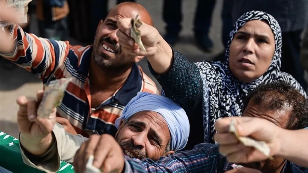 على جثث الفقراء: صندوق النقد والسيسي يحتفلان بالأرقام والشعب يموت جوعًا!