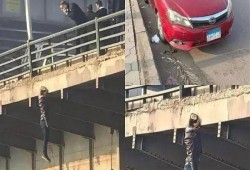 بالفيديو|| مشهد صادم لانتحار شاب أعلى كوبري المظلات