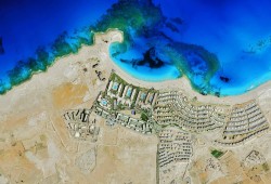 السيسي يدفع أكثر من 34 ألف فدانا بالبحر الأحمر إلى صكوك لسداد ديون  لصالح الامارات