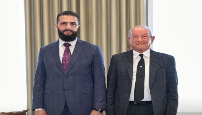 ساويرس في قصر الشعب.. أسرار تحولات رجل الأعمال تجاه أحمد الشرع